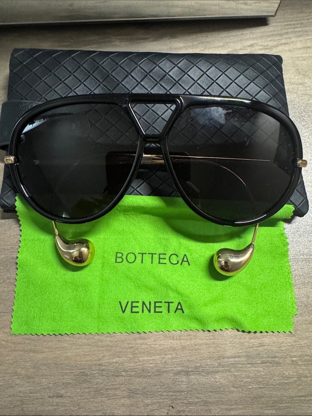 Bottega Veneta Black Shield Sunglasses with Gold Temples